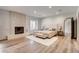 Spacious main bedroom boasts a fireplace, large window, and a comfortable seating area at 4162 Matterhorn Way, Las Vegas, NV 89124