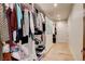 Walk-in closet with hanging racks, shelves, drawers and hardwood floors at 4162 Matterhorn Way, Las Vegas, NV 89124