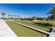 Enjoy a community bocce ball court with beautiful desert landscaping and clear blue skies at 4290 Solace St, Las Vegas, NV 89135
