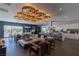 Relaxing resident lounge featuring comfortable seating, coffee bar, and an abundance of natural light at 4290 Solace St, Las Vegas, NV 89135