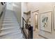This open staircase has a modern railing and leads to the upper level at 4290 Solace St, Las Vegas, NV 89135