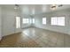 Bright living room featuring tile flooring and multiple windows at 4713 Vista Del Rey Ct, North Las Vegas, NV 89031