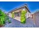 Covered patio and paved backyard perfect for outdoor dining and entertaining at 5091 E Beacon Ridge Dr, Pahrump, NV 89061