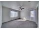 Bright bedroom with large windows and plush carpeting creating a cozy and inviting atmosphere at 5091 E Beacon Ridge Dr, Pahrump, NV 89061