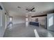 Open concept living space featuring kitchen with large island and sliding doors leading outside at 5091 E Beacon Ridge Dr, Pahrump, NV 89061