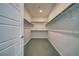 Organized walk-in closet with ample shelving providing efficient and accessible storage solutions at 5091 E Beacon Ridge Dr, Pahrump, NV 89061