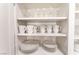 Kitchen cabinet featuring mugs, plates and glasses at 517 Casa Del Norte Dr, North Las Vegas, NV 89031