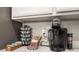 Coffee station featuring a Keurig coffee maker, pod storage, and a variety of tea and coffee selections at 517 Casa Del Norte Dr, North Las Vegas, NV 89031
