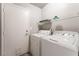 Laundry room includes washer and dryer at 517 Casa Del Norte Dr, North Las Vegas, NV 89031