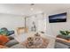Spacious living room features stylish decor, a mounted TV, and plenty of room for relaxation at 517 Casa Del Norte Dr, North Las Vegas, NV 89031