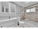 Bright bathroom with modern vanity, toilet, and shower over bath combo at 5205 Coral Glow Ct, Las Vegas, NV 89149