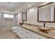 Elegant bathroom with double vessel sinks, granite counters, and a glass-enclosed shower at 5205 Coral Glow Ct, Las Vegas, NV 89149