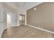 Inviting bedroom with vaulted ceiling, neutral walls, closet, and wood-look flooring at 5205 Coral Glow Ct, Las Vegas, NV 89149