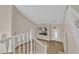Bright foyer with staircase, high ceilings, and a view of the front entrance at 5205 Coral Glow Ct, Las Vegas, NV 89149