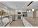 Bright kitchen featuring stainless appliances, granite countertops, and a large center island at 5205 Coral Glow Ct, Las Vegas, NV 89149