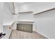 Organized walk-in closet featuring shelving, wooden racks, and built in dresser at 5205 Coral Glow Ct, Las Vegas, NV 89149