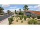 Attractive community entrance with stone signage, desert landscaping, and a welcoming atmosphere at 5209 Silica Chalk Ave, Las Vegas, NV 89115