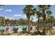 Relax in this community's swimming pool, surrounded by lush landscaping and lounge chairs at 5209 Silica Chalk Ave, Las Vegas, NV 89115