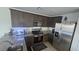 Well-equipped kitchen featuring stainless steel appliances, ample counter space, and modern lighting at 5209 Silica Chalk Ave, Las Vegas, NV 89115