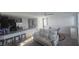 Wide open living area with modern furnishings, open to the kitchen, and plenty of natural light at 5209 Silica Chalk Ave, Las Vegas, NV 89115