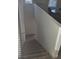 Carpeted staircase leading to upper level, offering a safe transition between floors in the home at 5209 Silica Chalk Ave, Las Vegas, NV 89115