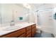 Clean bathroom with double sinks, updated fixtures, and shower-tub combo at 6121 Mission Gorge Ct, Las Vegas, NV 89130