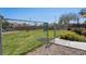 Enclosed dog park with grass, fencing, and signage outlining park rules at 6121 Mission Gorge Ct, Las Vegas, NV 89130