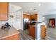 Well-equipped kitchen with stainless steel appliances, wood cabinets, and lots of counter space at 6121 Mission Gorge Ct, Las Vegas, NV 89130