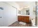 Main bathroom featuring double sinks, a soaking tub, and a separate shower at 6121 Mission Gorge Ct, Las Vegas, NV 89130