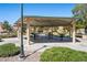 Covered picnic area with tables, providing a shaded space for community gatherings at 6121 Mission Gorge Ct, Las Vegas, NV 89130