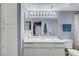 This bathroom is equipped with lots of vanity space, a large mirror, and a shower at 6650 W Warm Springs Rd # 1083, Las Vegas, NV 89118