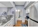 Bright kitchen with stainless steel appliances and white cabinets at 6650 W Warm Springs Rd # 1083, Las Vegas, NV 89118