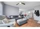 Comfortable living room with plush seating and modern ceiling fan at 6650 W Warm Springs Rd # 1083, Las Vegas, NV 89118