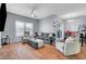 Inviting living room with comfortable seating, wood floors, and natural light at 6650 W Warm Springs Rd # 1083, Las Vegas, NV 89118