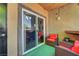 Charming patio with seating area and sliding glass door leading inside at 6650 W Warm Springs Rd # 1083, Las Vegas, NV 89118