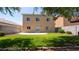 A serene backyard provides a lawn and ample space for outdoor enjoyment, with a patio area for seating and relaxation at 682 E Sole Addiction Ave, Las Vegas, NV 89183