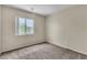A standard bedroom with neutral paint and carpet at 682 E Sole Addiction Ave, Las Vegas, NV 89183