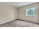 A standard bedroom with neutral paint and carpet at 682 E Sole Addiction Ave, Las Vegas, NV 89183