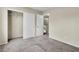 Spacious bedroom with neutral paint, carpet, and closet space at 682 E Sole Addiction Ave, Las Vegas, NV 89183