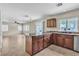 Bright eat-in kitchen featuring granite countertops and ample cabinet space at 682 E Sole Addiction Ave, Las Vegas, NV 89183