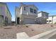 Well-maintained two-story home with a two-car garage and landscaped front yard in a friendly neighborhood at 6918 Dandelion Park Ave, Las Vegas, NV 89113