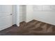This walk-in closet has built-in wire shelving and neutral carpet at 6918 Dandelion Park Ave, Las Vegas, NV 89113