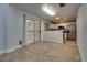 Dining area featuring tiled floors, sliding doors to patio, and open access to the kitchen at 7240 Wandering Star Ct, Las Vegas, NV 89131