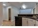 The kitchen features granite countertops, tiled floors, stainless steel sink, and a pantry nearby at 7240 Wandering Star Ct, Las Vegas, NV 89131