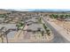 Stunning overhead real estate picture shows tile roof in a desert landscape at 7258 W Le Baron Ave, Las Vegas, NV 89178