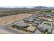 Desert home featuring desert landscaping, a pool, and an additional casita at 7258 W Le Baron Ave, Las Vegas, NV 89178