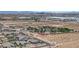 This elevated image shows desert landscape, mountains, and the Las Vegas strip at 7258 W Le Baron Ave, Las Vegas, NV 89178