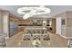 Gourmet kitchen features stainless steel appliances, a large island, and custom cabinetry at 7258 W Le Baron Ave, Las Vegas, NV 89178