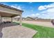 Covered patio provides ample room for outdoor living and entertaining at 7258 W Le Baron Ave, Las Vegas, NV 89178