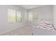 A bedroom with large windows at 7325 Perkins Hill St, Las Vegas, NV 89166